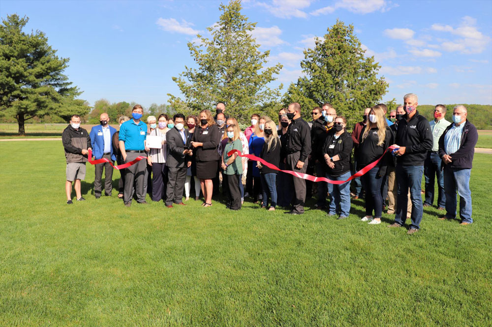 <b>FMCH and Great River Health officials, providers and staff, and representatives of Carl A. Nelson & Company and other contractors, join members of the Fort Madison Area Chamber of Commerce for a ribbon cutting ceremony May 7, 2021, outside the new behavioral health unit.</b>